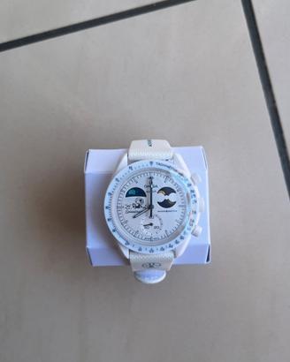omega swatch mission to earthphase moonshine gold