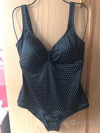 Costume intero Olaian nero con pois bianchi