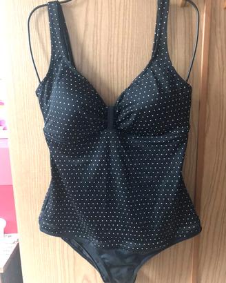 Costume intero Olaian nero con pois bianchi