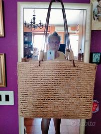 borsa in paglia foderata con taschine interne €6,0