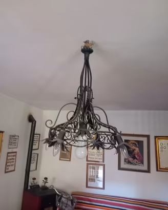 lampadari in ferro battuto realizzati a mano 