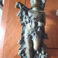 Articolo antico a forma di angelo 