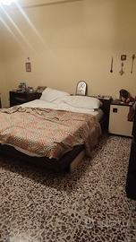 frigorifero, lavatrice, stanza da letto.