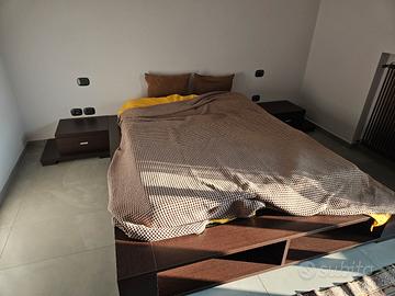 Letto matrimoniale contenitore  in legno marrone