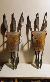 Applique in ferro battuto stile brutalista