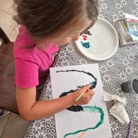 Educatrice gesto grafico e aiuto compiti