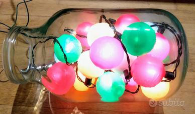 Luci natalizie con vaso Cd - Vhs - Luci