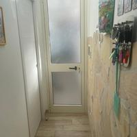 Porta in alluminio con vetro