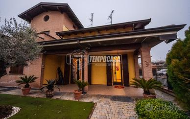 Villa a schiera con giardino