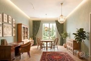 QUADRILOCALE con GIARDINO / TIVOLI