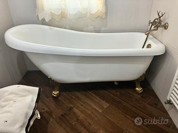 VASCA CON PIEDI IN ORO