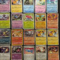Lotto 100 carte Pokemon Holo e Reverse varie espan