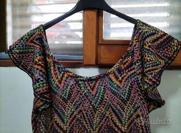Vestito/copricostume
