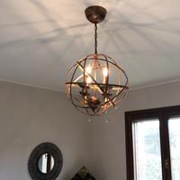 Lampadario e applique in ferro brunito