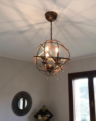 Lampadario e applique in ferro brunito