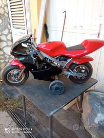 Minimoto elettrica completa di batteria e rotelle