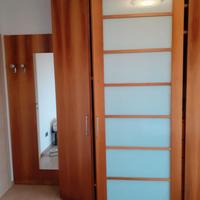 ARMADIO AD ANTE SCORREVOLI in vero legno