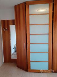 ARMADIO AD ANTE SCORREVOLI in vero legno