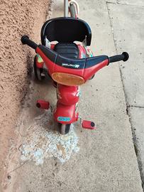 Triciclo Peg Perego Cucciolo rosso con maniglione