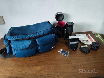 borsa fotografo con obiettivo