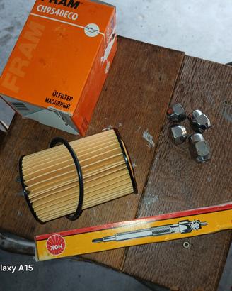 pastiglie freno,filtro olio e candeletta nissan te