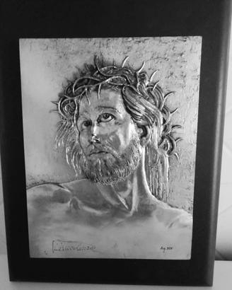 Cornice con Cristo in argento