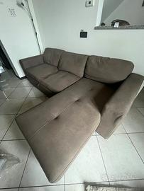 Divano letto con penisola contenitore