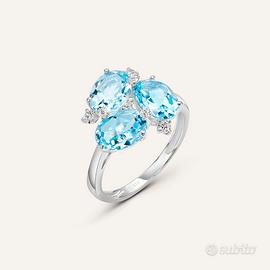 Anello oro bianco 9k e topazio