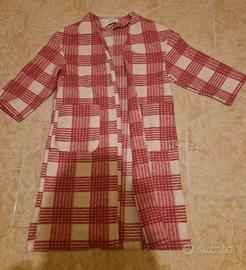 Cappotto leggero (o un cardigan lungo)

