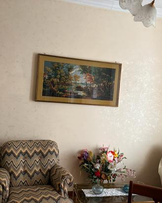 Due poltrone con copri poltrona tinta panna