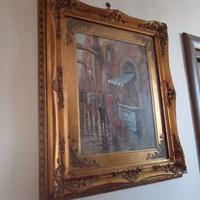 Quadro con cornice dorata intagliata