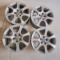 Cerchi in lega alfa romeo completi di coprimozzi