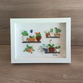 quadro con vetri e maioliche marine