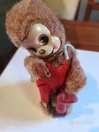 Orsetto calzolaio Gioco in latta vintage.