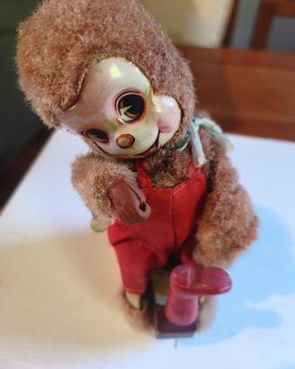 Orsetto calzolaio Gioco in latta vintage.