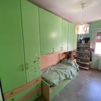 cameretta a ponte e divano a due posti