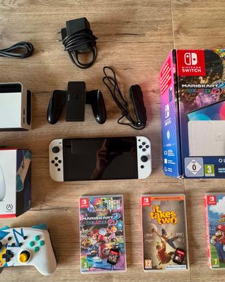Nintendo Switch OLED Bianca + accessori e giochi