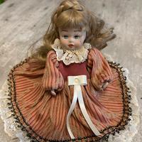 Bambola in porcellana