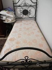 letto  singolo in ferro battuto