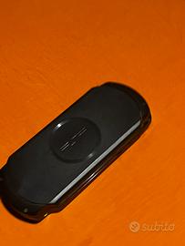 psp con giochi e caricabatterie