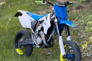 TM 125 EN-SMR