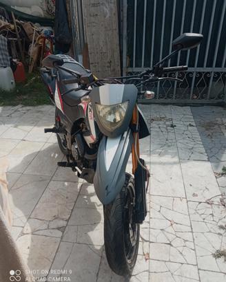 TXM 125 