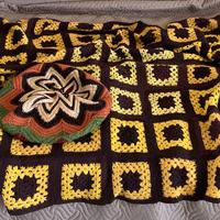 Copertina in lana vintage con cuscino tondo