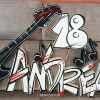 Chitarra in polistirolo con nome "Andrea"