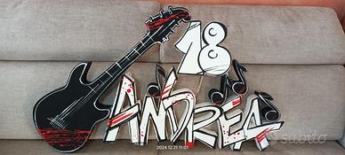 Chitarra in polistirolo con nome "Andrea"
