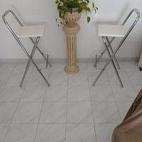 2 sgabelli in acciaio con seduta laccata FIAM.