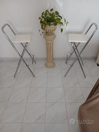 2 sgabelli in acciaio con seduta laccata FIAM.