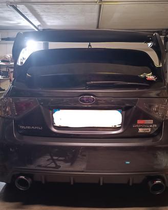 Subaru impreza hatchback scarico doppio