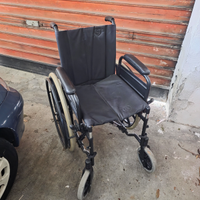 Carrozzina disabili con poggiapiedi Surace