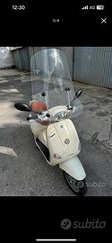 Vespa et4 125